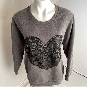 Madison Marcus gray pullover sweatshirt with black cutout lace heart detail